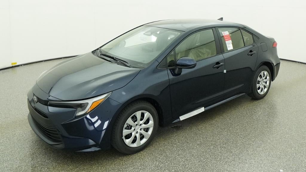 2026 Toyota Corolla Hybrid Hybrid LE in Blueprint — front three-quarter view